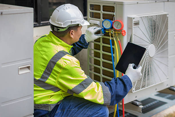 Professional Hvac technician working in Dorchester Center, MA